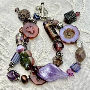 Fab boho purple on this one-of-a-kind bracelet- sterling silver, handmade. Primo